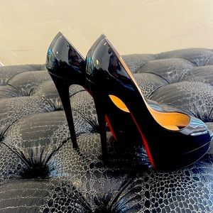 Christian Louboutin, 6 inches. Platform open toe pumps.